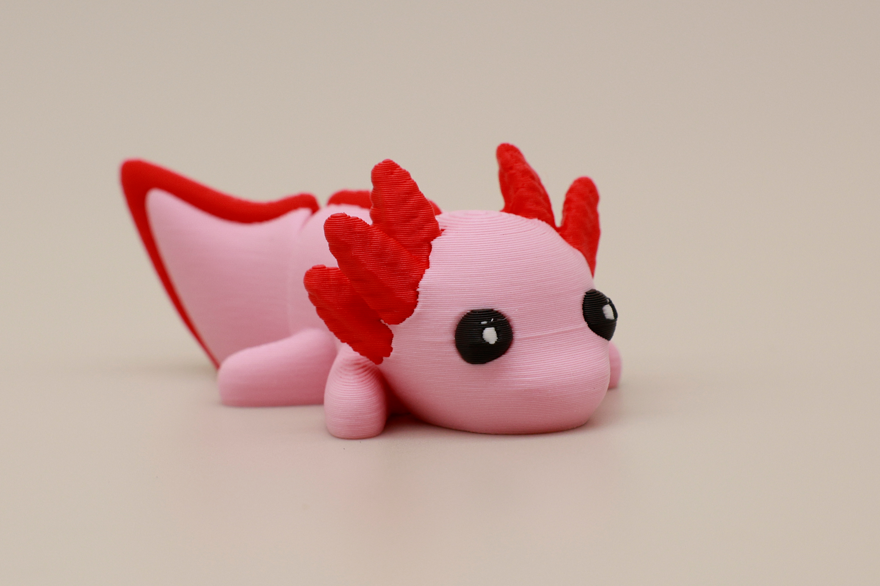 Vibrant pink axolotl articulating print